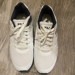 White, red, and navy blue Fila -men’s 7…women’s 5.5